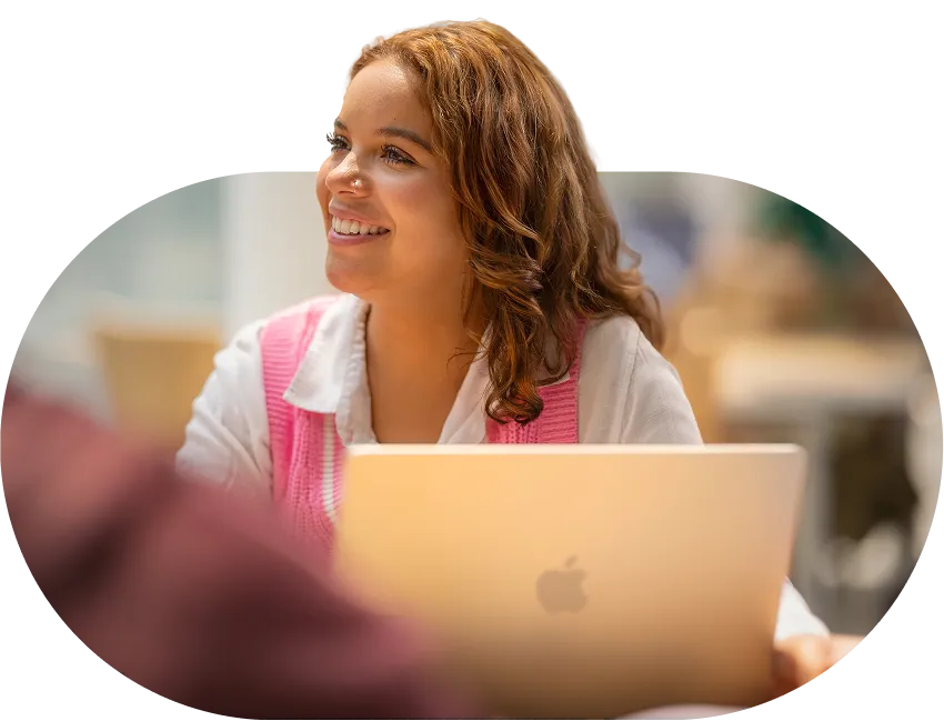 A person checking their FileMaker version on a laptop.